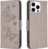 Mobigear Telefoonhoesje geschikt voor Apple iPhone 15 Pro Hoesje | Mobigear Butterfly Bookcase Portemonnee | Pasjeshouder voor 3 Pasjes | Telefoonhoesje voor Pinpas / OV Kaart / Rijbewijs - Grijs