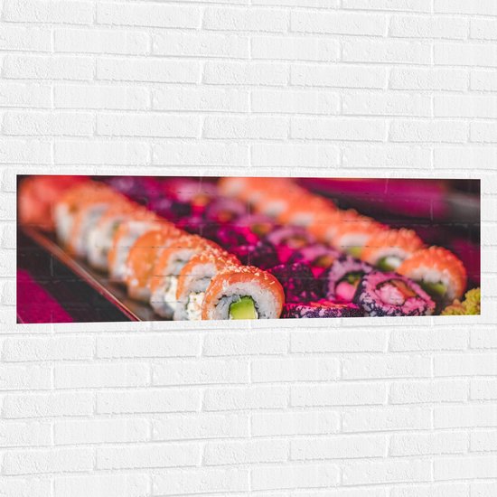 Muursticker - Schaal Vol met Verschillende Smaken Sushi in Paars Licht - 120x40 cm Foto op Muursticker