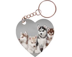 foto van Sleutelhanger hartje 5x5cm - Husky Pups op Rij