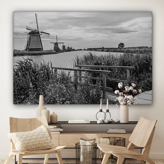 Photo Zwart et blanc des moulins à vent de Kinderdijk aux Nederland Toile 180x120 cm - Tirage photo sur toile (Décoration murale salon / chambre) XXL / Groot format!