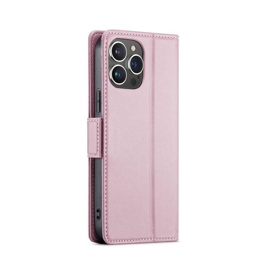 Étui portefeuille rose en similicuir, style livre, avec fermeture magnétique et découpe pour les appareils photo.