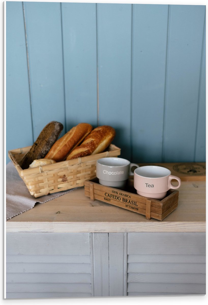 PVC Schuimplaat- Mand met Broodjes en Koffie op Kast - 40x60 cm Foto op PVC Schuimplaat