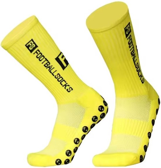 Chaussettes de sport jaunes avec crampons antidérapants et logo "FOOTBALL SOCKS".