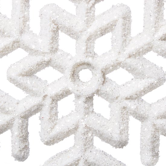 Detail van een witte, glitterende sneeuwvlok kersthanger.