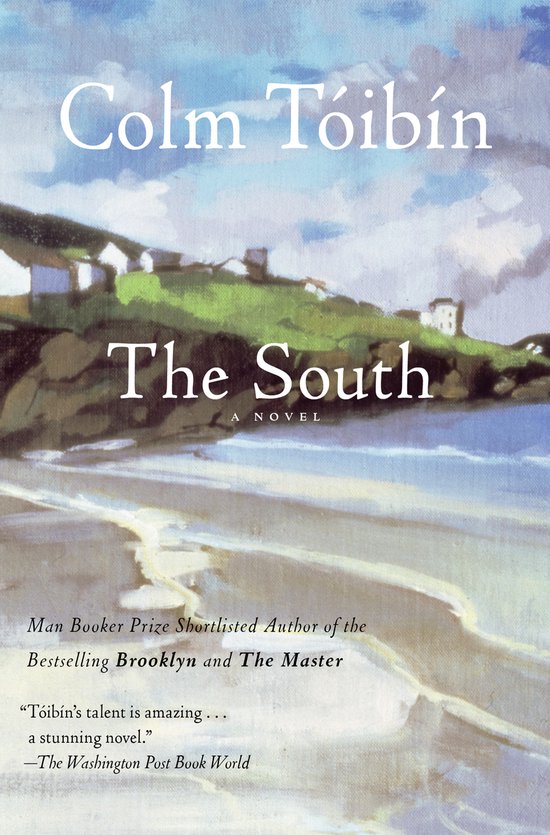 Boekcover van 'The South' van Colm Tóibín met een schilderachtige kustlijn, witte huizen op een heuvel en een strand.