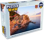 Puzzel Een oranje gekleurd Cinque Terre door de laagstaande zon in Italië - Legpuzzel - Puzzel 500 stukjes