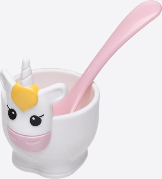 Wit eierdopje met een unicorn gezicht en een roze lepel.