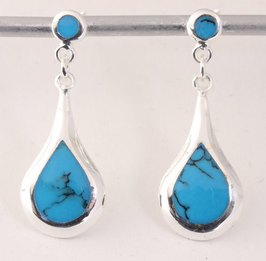 Druppelvormige hoogglans zilveren oorstekers met blauwe turkoois