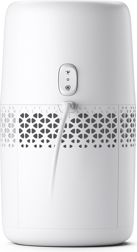 Arrière d'un humidificateur d'air blanc avec boutons de commande et motif décoratif.