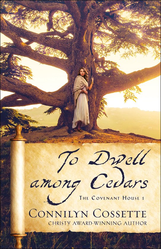 Een vrouw in een lange, witte jurk en een bruine sjaal staat voor een grote, oude boom. De titel 'To Dwell among Cedars' staat op de omslag.