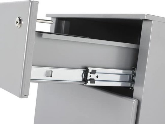 Gros plan d'un caisson de bureau en aluminium avec un tiroir ouvert sur rails métalliques. Serrure visible.