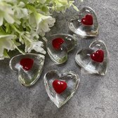 Hart van glas, met rood hartje.