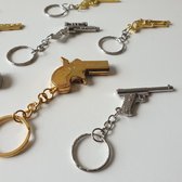Pistooltje sleutelhangertjes - uitdeelcadeautjes