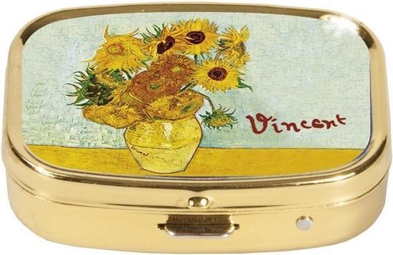 Boîte à pilules dorée avec le tableau Les Tournesols de Van Gogh et la signature 'Vincent'.