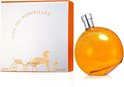 Elixir des Merveilles Eau de Parfum, 100 ml (3.3 FL.OZ). Doos met paard en wagen en parfumflesje, wit met oranje accenten.