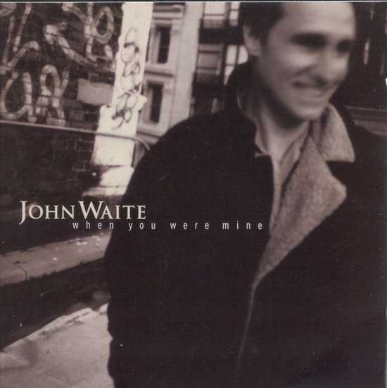 Albumhoes met John Waite en de titel 'JOHN WAITE when you were mine'. Zwart-wit foto.