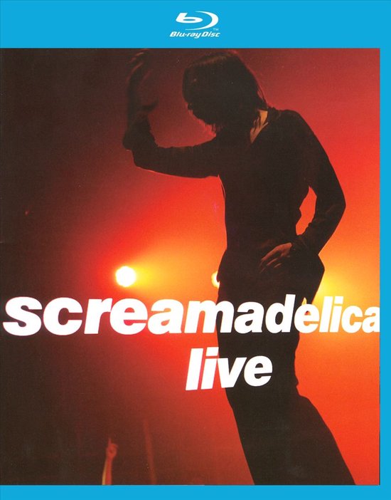 Blu-ray hoes met silhouet van een zanger op podium met oranje belichting, tekst 'Screamadelica live'.