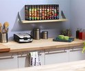 Tefal snackapparaat op aanrecht met op de plank dozen van het snackapparaat.