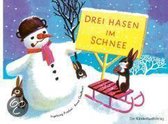 Drei Hasen im Schnee
