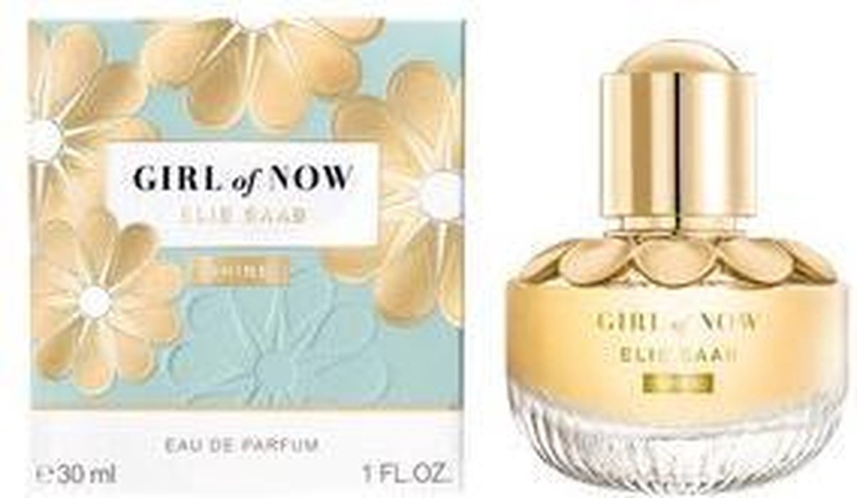 Doosje Elie Saab Girl of Now Shine Eau de parfum met gouden bloemen op blauwe achtergrond