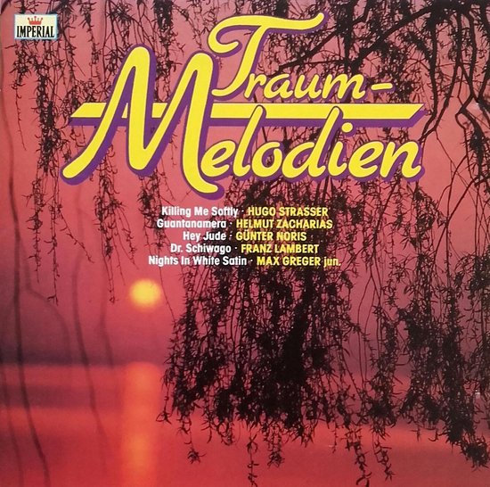 Albumhoes met de titel 'Traum Melodien', met bloeiende takken en een zonsondergang.