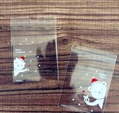 40x Transparante Kerst Uitdeelzakjes - Traktatie Zakjes met plakstrip - Snoepzakjes - 7x7 cm - 20 stuks kitten en 20 stuks beertje