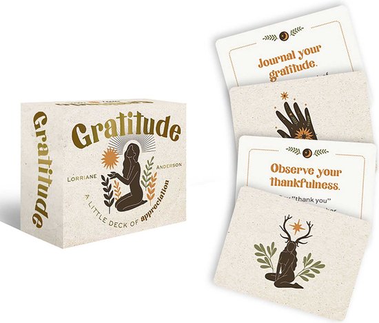 Doos met 'Gratitude' erop, met kaarten met illustraties zoals een hand met sterren en een hert.
