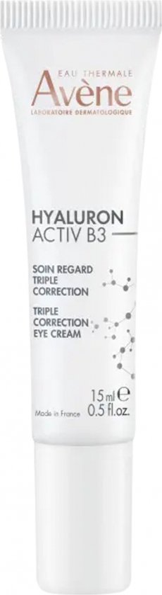 Witte tube met rode en grijze tekst: Avène Hyaluron Activ B3 Triple Correction Eye Cream.