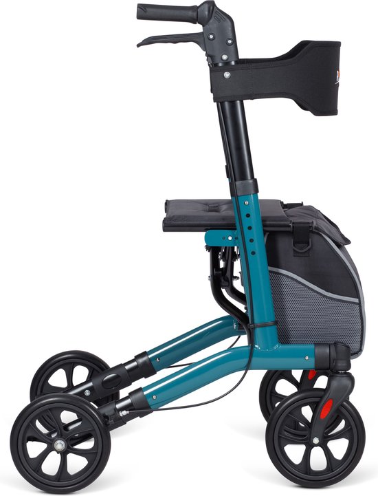 Zijaanzicht van een turquoise rollator met zwarte tas, zitting en rugsteun.