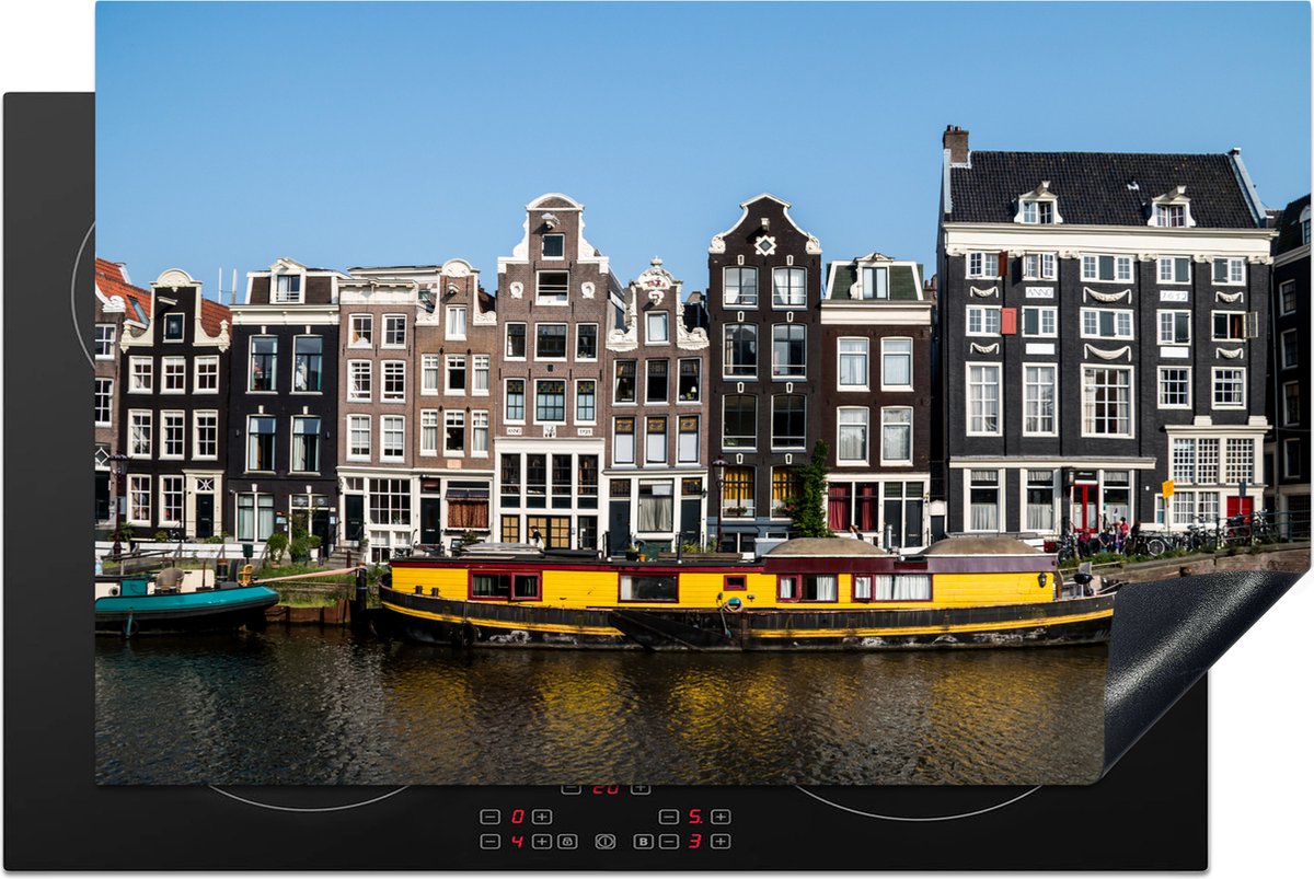 KitchenYeah® Inductie beschermer 80x52 cm - Een gele woonboot in de Amsterdamse gracht - Kookplaataccessoires - Afdekplaat voor kookplaat - Inductiebeschermer - Inductiemat - Inductieplaat mat