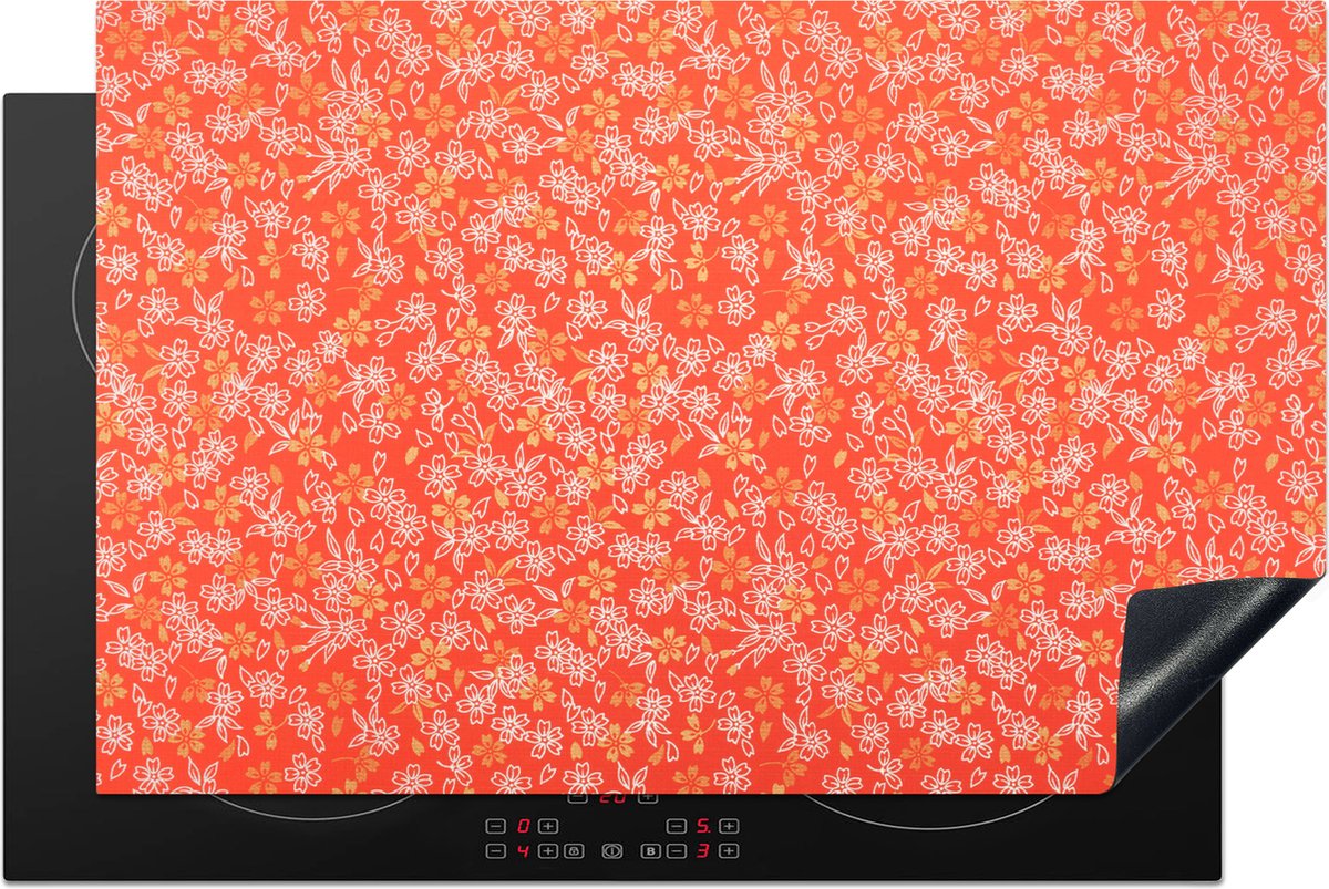 KitchenYeah® Inductie beschermer 81x52 cm - Een oranje met wit bloemdessin - Kookplaataccessoires - Afdekplaat voor kookplaat - Inductiebeschermer - Inductiemat - Inductieplaat mat