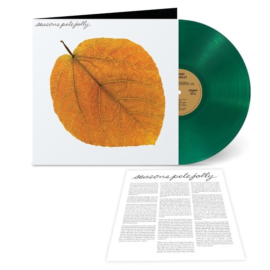 Disque vinyle vert avec pochette présentant une feuille d'automne. La pochette indique 'seasons pete jolly'.