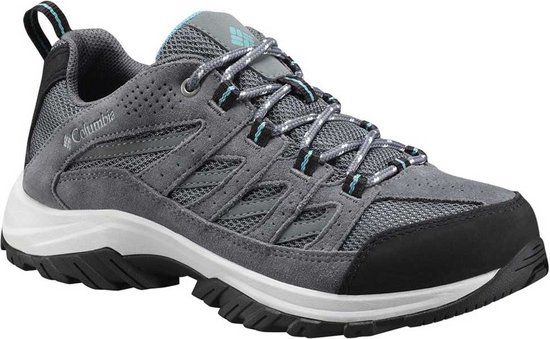 Grijze wandelschoen voor dames met veters, mesh en suède details, witte middenzool en zwarte buitenzool.