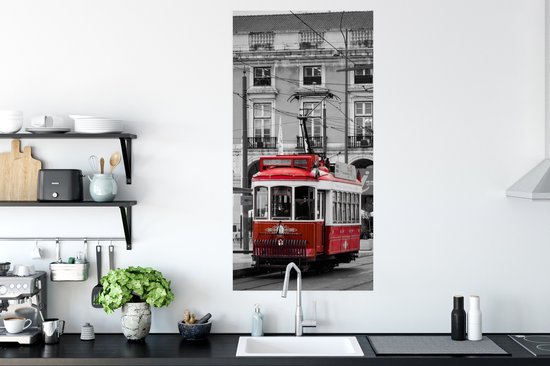 Poster Zwart-wit foto met een rode tram - 60x120 cm