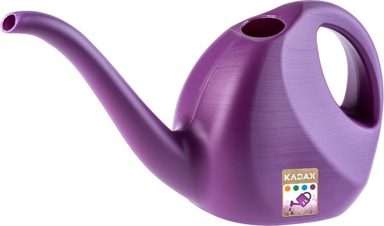 Tuingieter En Takken Van Een Tot Bloei Komende Wilg in B Stock Foto