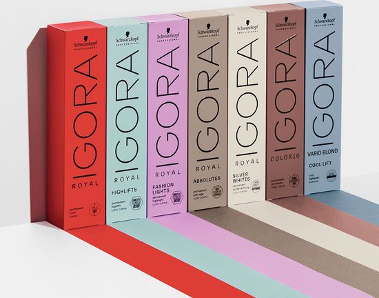 Rijen Schwarzkopf IGORA haarkleurdozen in verschillende kleuren: rood, roze, paars, beige, lichtbruin, bruin en blauw.