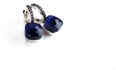 Zilveren oorringen oorbellen model pomellato gezet met donker blauwe steen