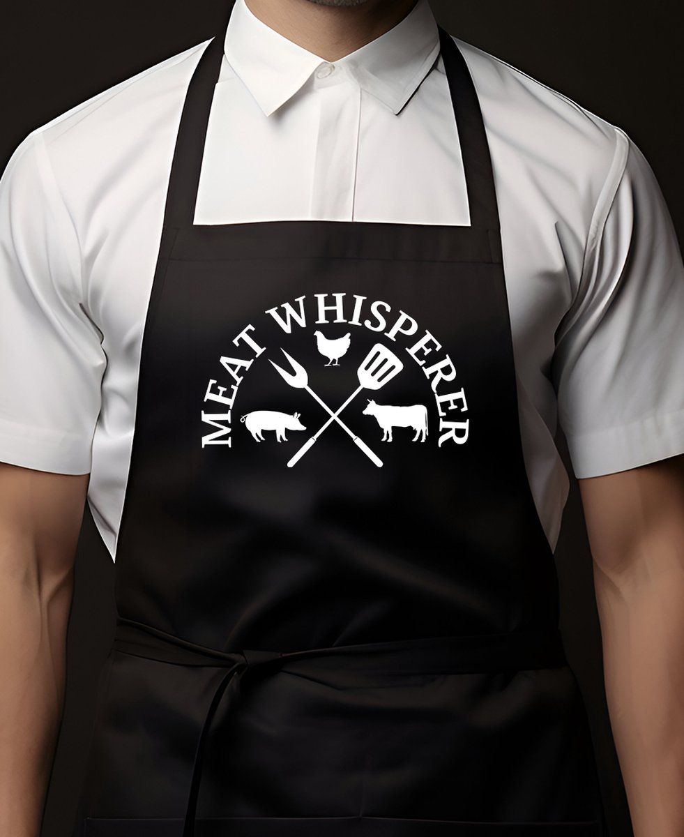 Keukenschort Zwart | 65x90cm | MEAT WHISPERER | 100% katoen | Schort / Keukenschorten | Verjaardags cadeau | BBQ - VADERDAG - MOEDERDAG - Met tekst
