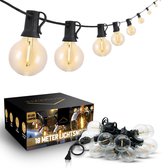 Bol.com Homezie Lichtsnoer | 18 meter met 32 kunststof LED bulbs | Inclusief 3m verlengkabel met dimmer | Warm wit | Waterdicht ... aanbieding