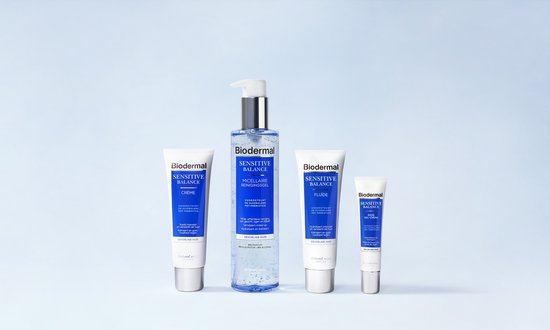 Lijnafbeelding van vier Biodermal Sensitive Balance producten op een lichte achtergrond: crème, micellaire reinigingsgel, fluide en oogcrème.
