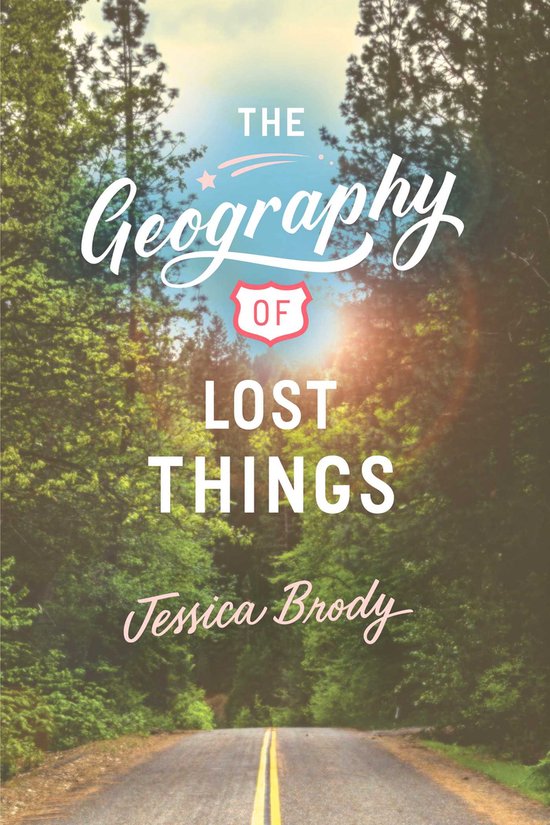 Boekomslag van 'The Geography of Lost Things' met de titel en auteur Jessica Brody. Een landweg loopt door een bos.