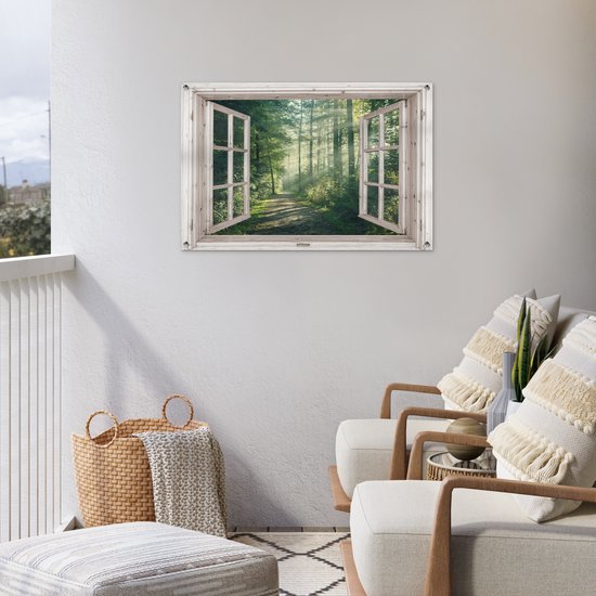 Poster van een bosweg met zonnestralen, in een open raam, boven twee fauteuils op een balkon.