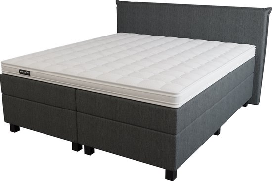 Grijze boxspring met wit matras en "Mörgenn" logo, op witte achtergrond.