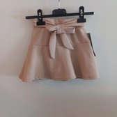 New Collection - Broek/rok kort met strikje - beige - maat 122/128