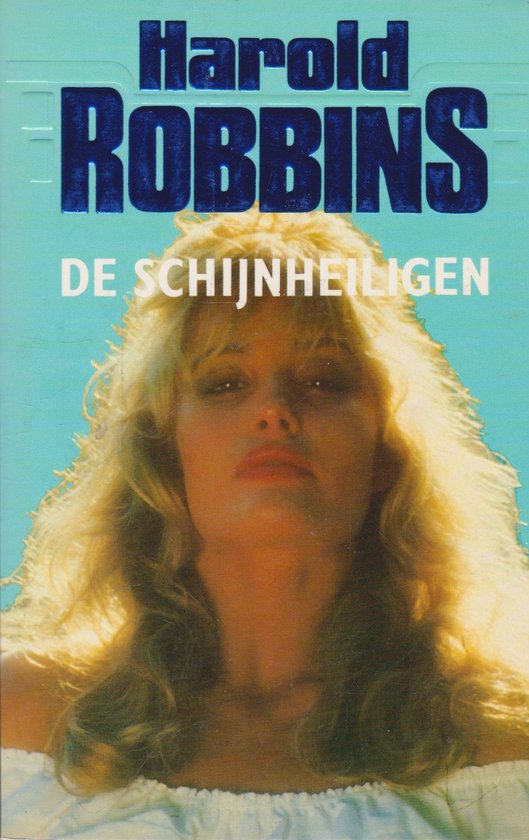 Boek "De Schijnheiligen" van Harold Robbins met een blonde vrouw met wapperend haar.