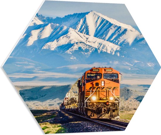WallClassics - PVC Schuimplaat Hexagon - Oranje Trein in IJslandschap op Spoor - 60x52.2 cm Foto op Hexagon (Met Ophangsysteem)