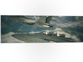 WallClassics - PVC Schuimplaat- Twee Vliegtuigen boven Bergen en Wolken - 90x30 cm Foto op PVC Schuimplaat