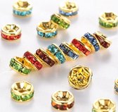 Rhinestone spacer beads, goud met multi kleur chatons, 6x3mm. Verkocht per 100 stuks !!