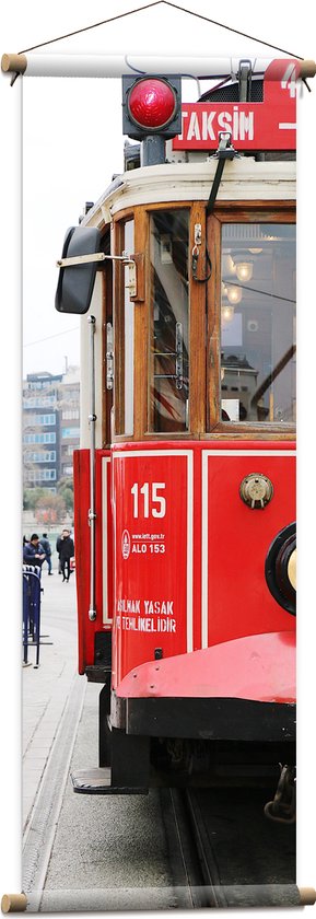 WallClassics - Textielposter - Rode Tram door de Stad - 40x120 cm Foto op Textiel
