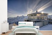 Behang - Fotobehang Foto van De Schilthorn in Zwitserland - Breedte 390 cm x hoogte 260 cm